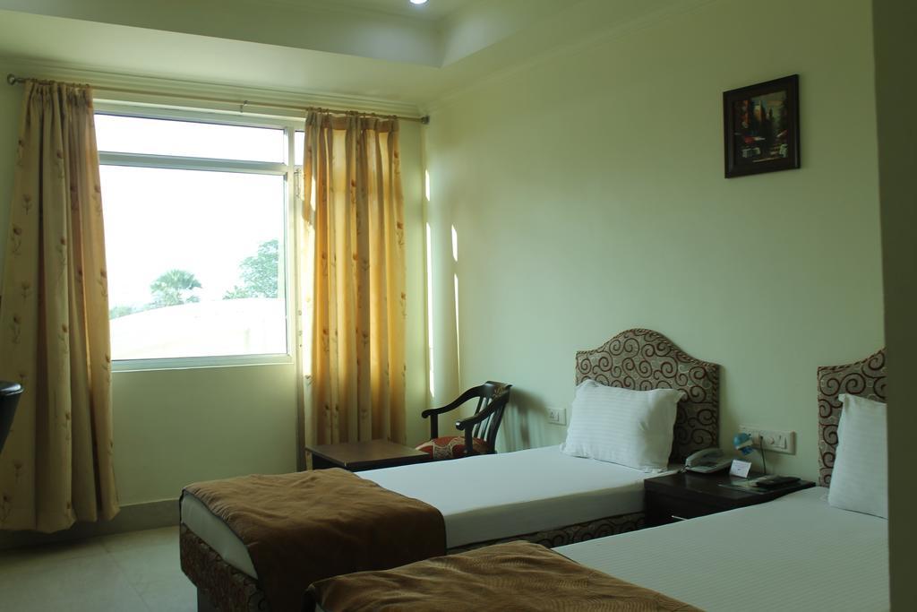 Bodhgaya Gautam Hotell Rom bilde