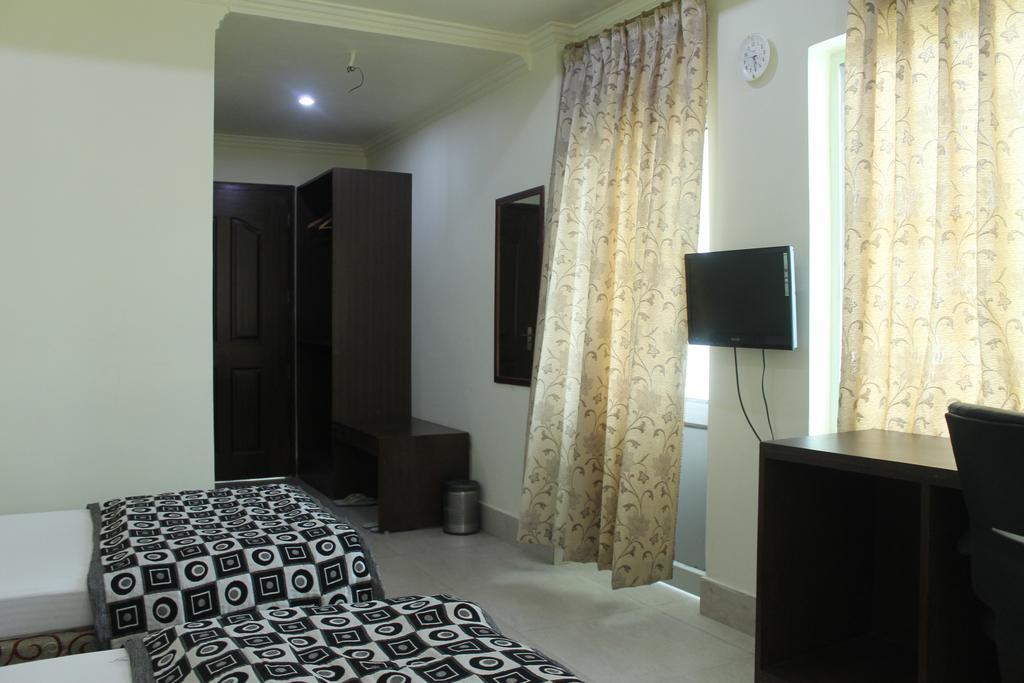 Bodhgaya Gautam Hotell Rom bilde